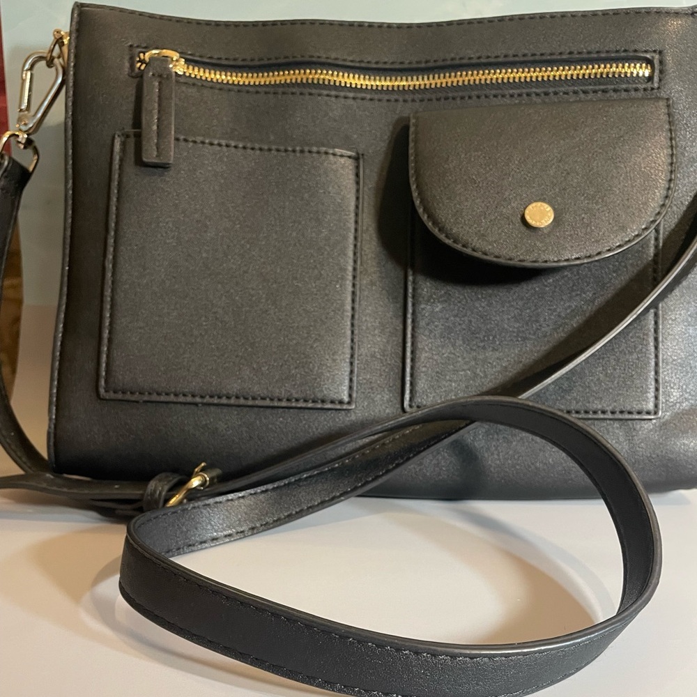 Elegant Black Leather Shoulder Bag
Steve Madden. Free shipping